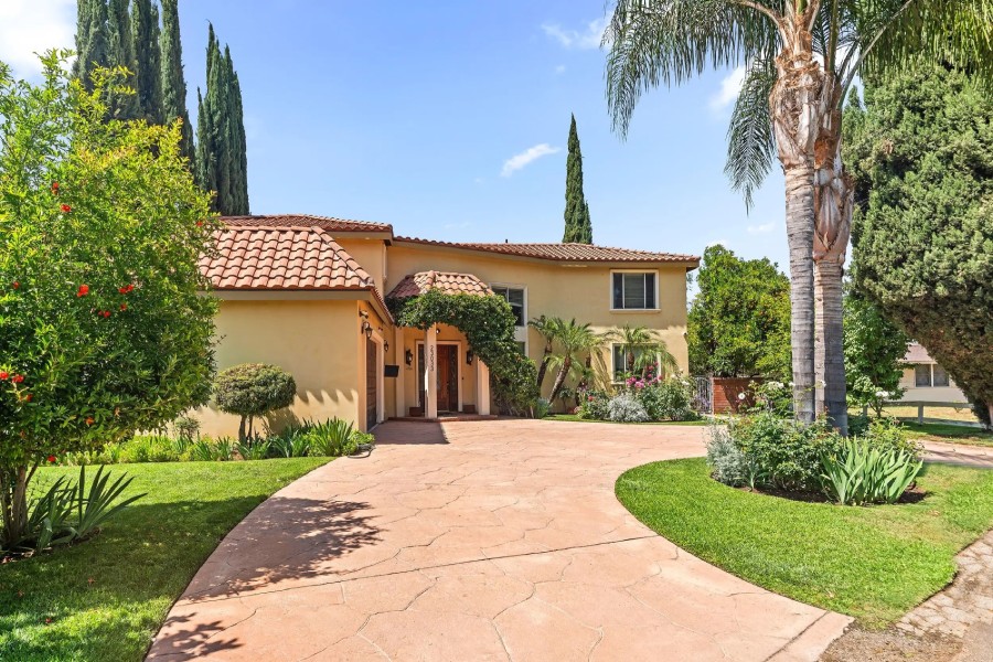 Exterior view of the Villa Healing Center surrounded by greenery, highlighting a peaceful healing environment.